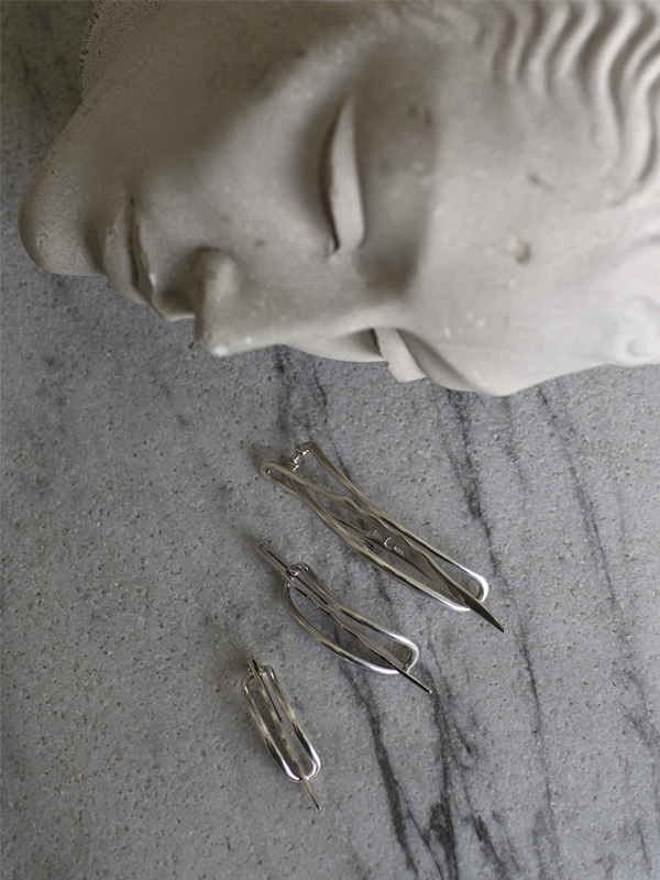 Tre håndlavede hårspænder i sølv fra Kay Bojesen